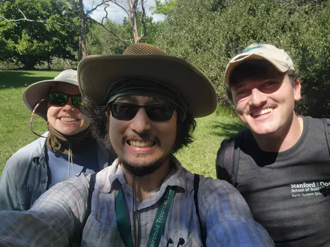 Three lab members take a selfie in the field at Fairchild Tropical Botanic Garden